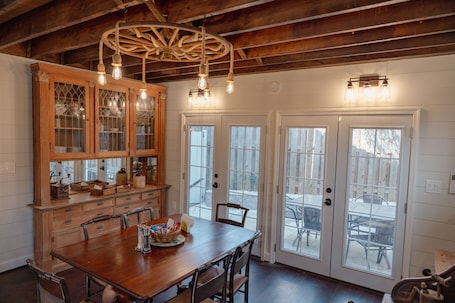Dining. Fully renovated 1800s Carriage House seamlessly blends history w/modern luxury.