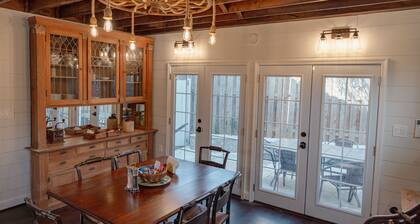 Fully renovated 1800s Carriage House seamlessly blends history w/modern luxury.