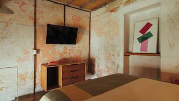 Deluxe kamer | Een kluis op de kamer, verduisterende gordijnen