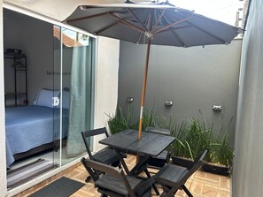 1 bedroom, desk, iron/ironing board, travel crib