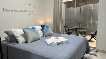 1 bedroom, desk, iron/ironing board, travel crib