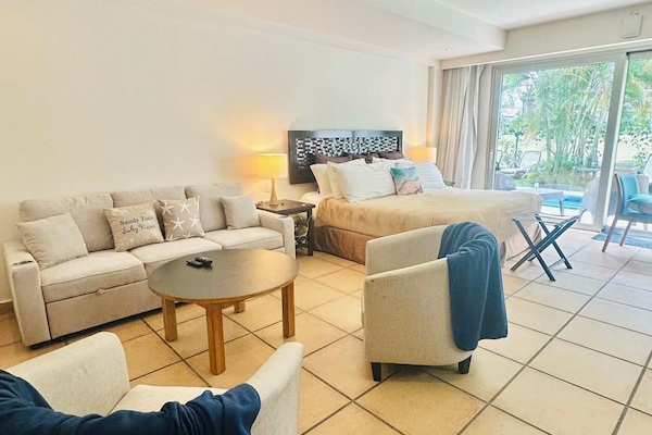 Welcome to your suite! King size bed and a double sized pull out.-71" long x 51"