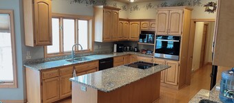 5 Bed/ 4 Bath 2.9 Miles to Lambeau Field and 1.9 Miles to Green Bay Airport .