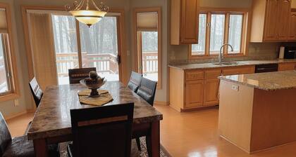 5 Bed/ 4 Bath 2.9 Miles to Lambeau Field and 1.9 Miles to Green Bay Airport .