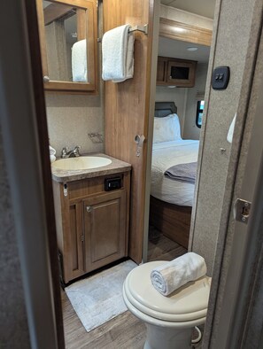 Shower, towels, soap, shampoo