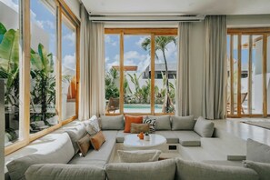 Deluxe Villa, 3 Bedrooms, Patio, Pool View | Living room