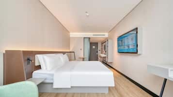 Habitación individual superior | Ropa de cama de alta calidad y escritorio