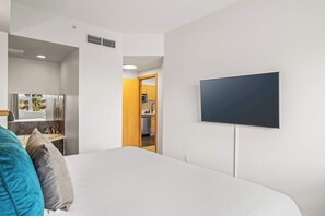 1 bedroom, desk, iron/ironing board, travel crib