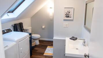 Shower, eco-friendly toiletries, hair dryer, towels