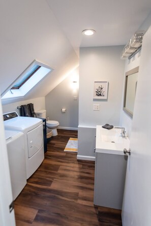 Shower, eco-friendly toiletries, hair dryer, towels