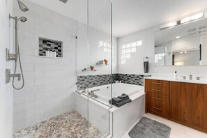 Hair dryer, towels, soap, shampoo