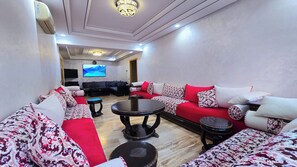 Family Apartment | Living area | Flat-screen TV, Netflix, streaming services, computer monitors - Luxor Home - Spacious & proximity to CFC (Casablanca)