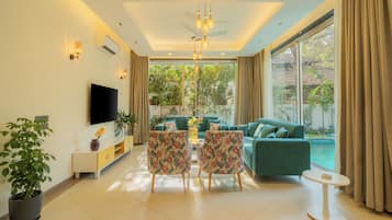 Villa, 4 Bedrooms, Balcony, Garden View | Living area | Flat-screen TV