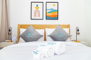 2 chambres, coffres-forts dans les chambres, fer et planche à repasser