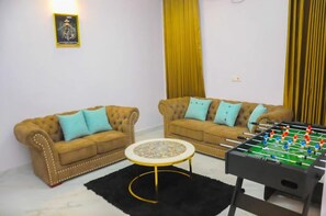 Deluxe Room, Balcony, City View | Living area - V City Lodge Hotel and Suites (Abuja)