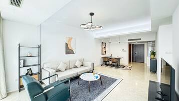 Luxury Apartment, 3 Bedrooms, Non Smoking, City View | Living room | 55-inch LED TV with cable channels