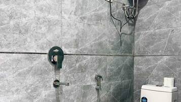 Shower, hair dryer, towels, soap