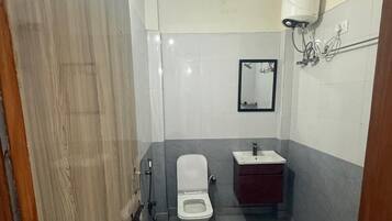 Shower, slippers, towels, soap