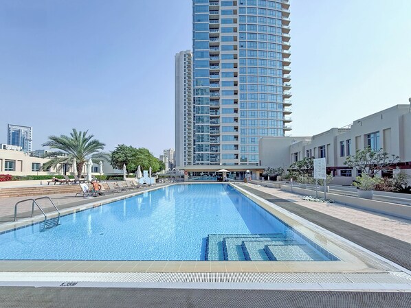 Outdoor pool, pool umbrellas, pool loungers