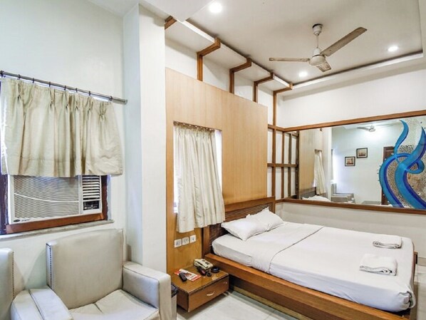 Comfort Suite | Ruang tamu | TV 