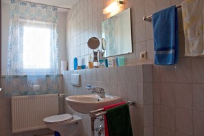 Ducha, secador de pelo, toallas