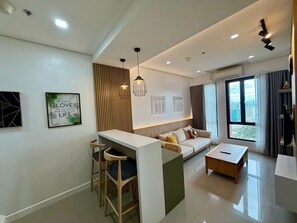 Premier Suite, Bay View | Living area | TV