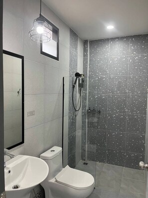 Shower, towels, soap, shampoo