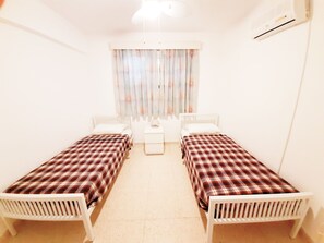 2 dormitorios, tabla de planchar con plancha, wifi y ropa de cama