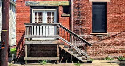 Grab a latte at the coffee shop, then walk a block to the floodwall where you'll find 2000 feet of murals showcasing the history of Portsmouth. After that, walk back up 2nd Street and check out the antique shops and local restaurants.