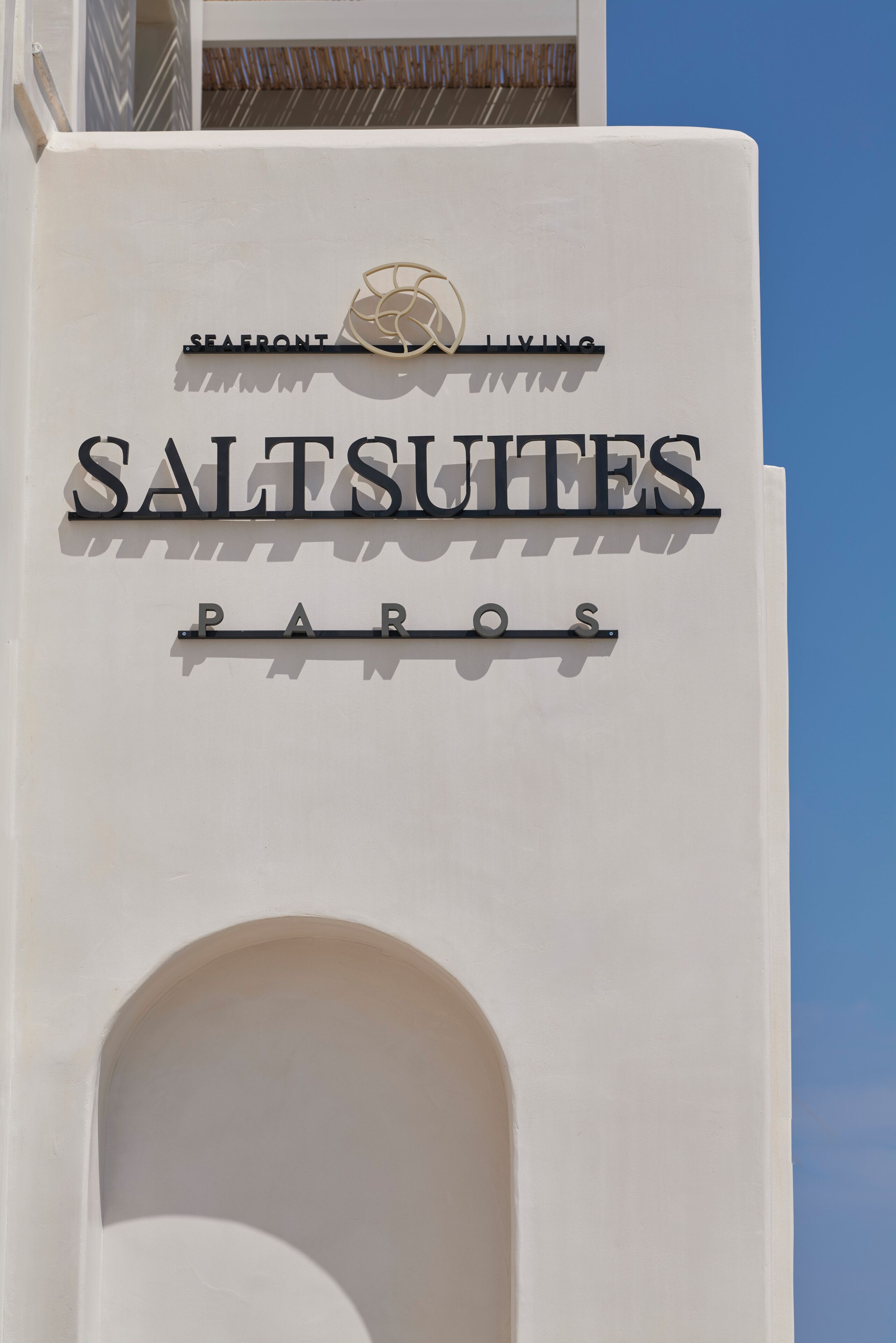 A sign for SALTSUITES PAROS.