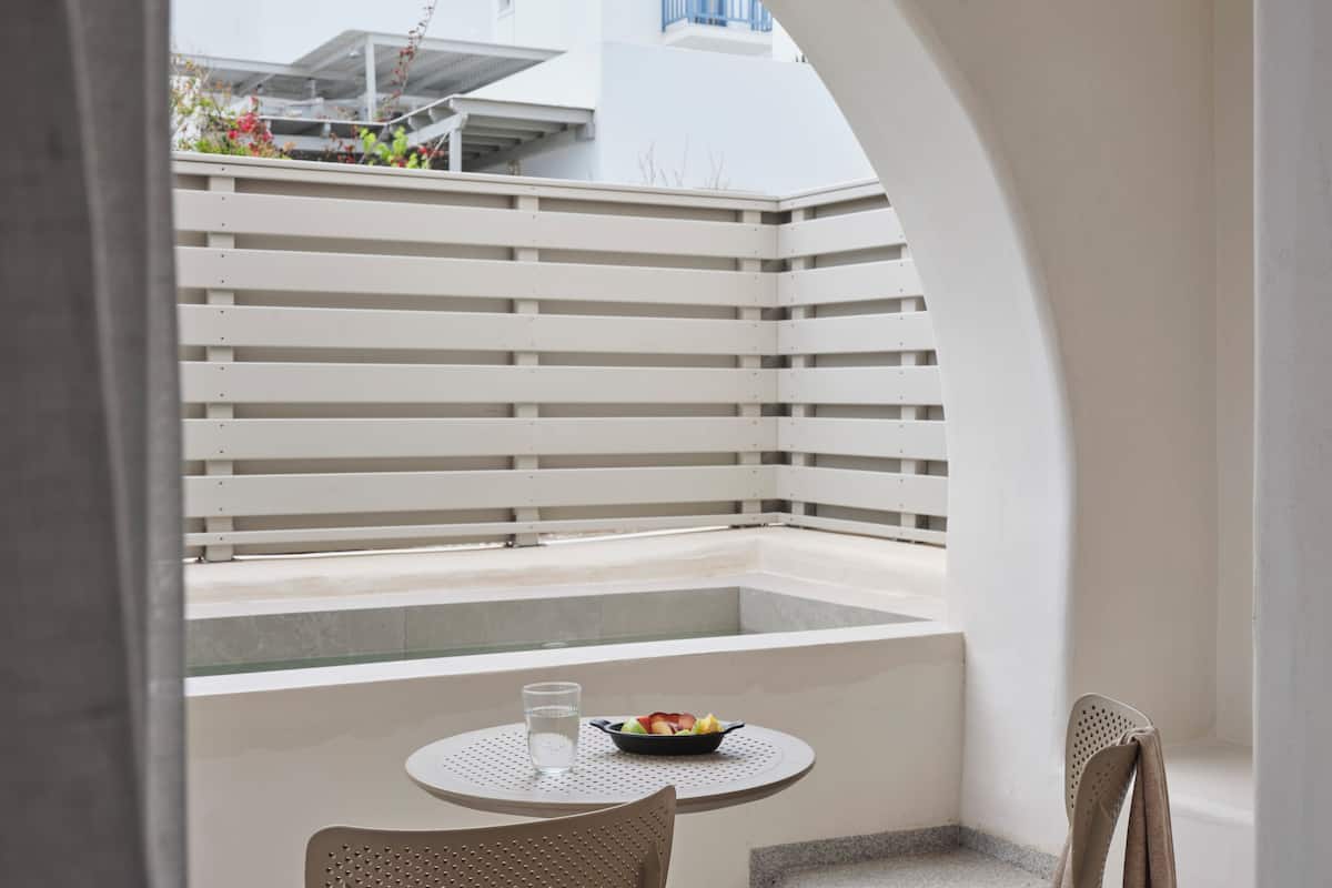 Superior Suite, Pool View | 1 bedroom, in-room safe, iron/ironing board, free WiFi