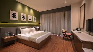 Deluxe Room, City View | Desk, laptop workspace, iron/ironing board, free WiFi