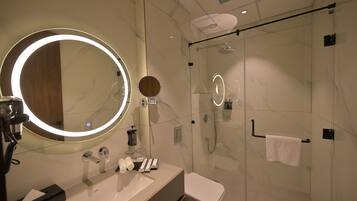 Deluxe Room, City View | Bathroom | Shower, slippers, soap, shampoo