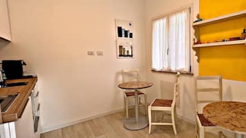 Apartamento, vista para a cidade | Cozinha privada