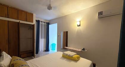 NYALI 1BR/Hot Shower/AC/Parking behind Quickmart