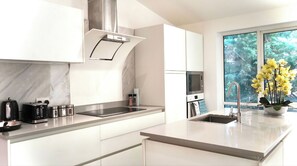 Villa | Private kitchen | Fridge, microwave, oven, stovetop