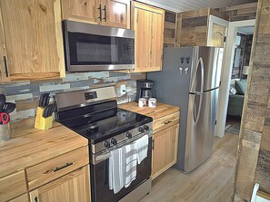 Private kitchen - Redbud Tiny Home Resort (Big Cabin)