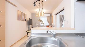 Classic Apartment | Private kitchen | Dining tables