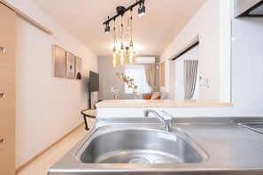 Classic Apartment | Private kitchen | Dining tables