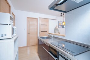 Superior Apartment, Balcony | Private kitchen | Dining tables - Plandor hanazono (Osaka)