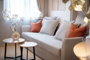 Classic Apartment | Living area | 50-inch flat-screen TV with cable channels