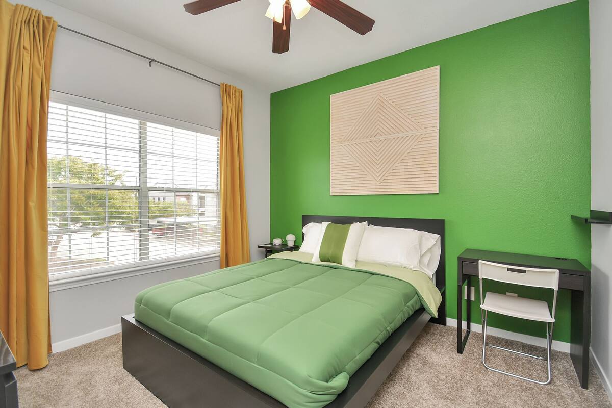 Premium bedding, desk, laptop workspace, free WiFi