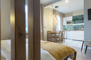 Classic Studio Suite | Living area | Flat-screen TV