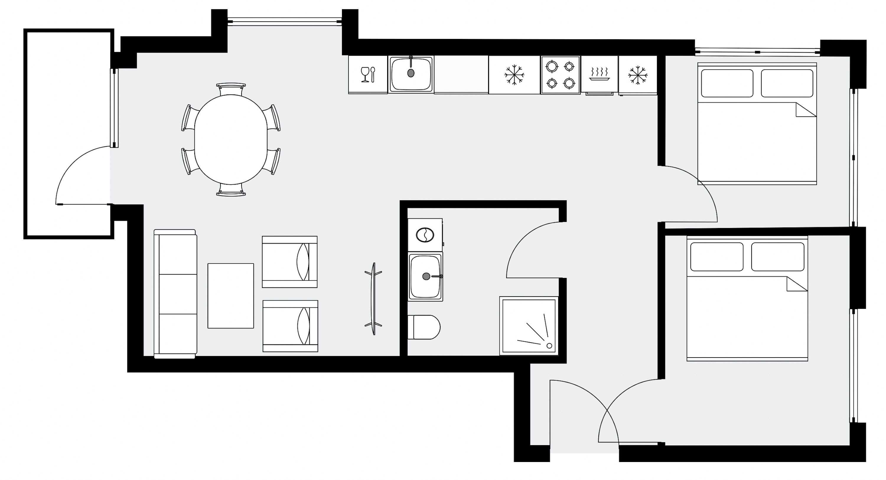 Un plan d’étage d’un hôtel comprenant un espace repas, une cuisine et deux chambres.
