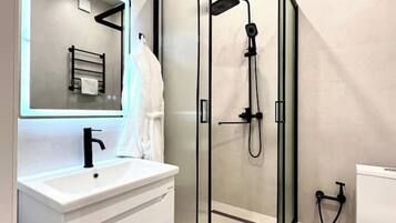 Hair dryer, bidet, towels, soap
