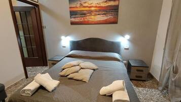 1 chambre, fer et planche Ă repasser, draps fournis