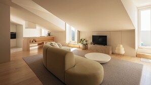 A modern loft with a living area featuring a sofa, a coffee table, and a flat-screen TV. - LIOZ Lisboa (Lisbon)