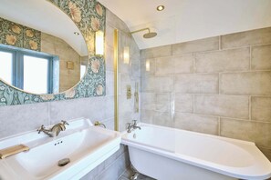 Shower, hair dryer, towels, shampoo