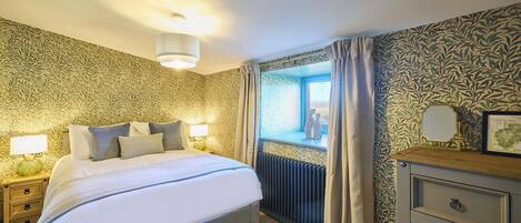 2 dormitorios, tabla de planchar con plancha, wifi y ropa de cama