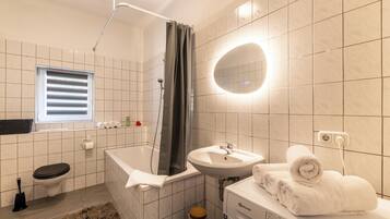 Hair dryer, towels, soap, toilet paper